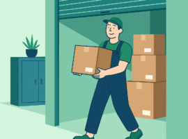 Employé portant un carton dans un garde-meuble à Genève pour stockage et déménagement